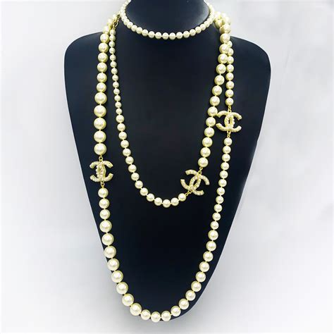 chanel chain and lock necklace|Chanel pearl necklace price list.